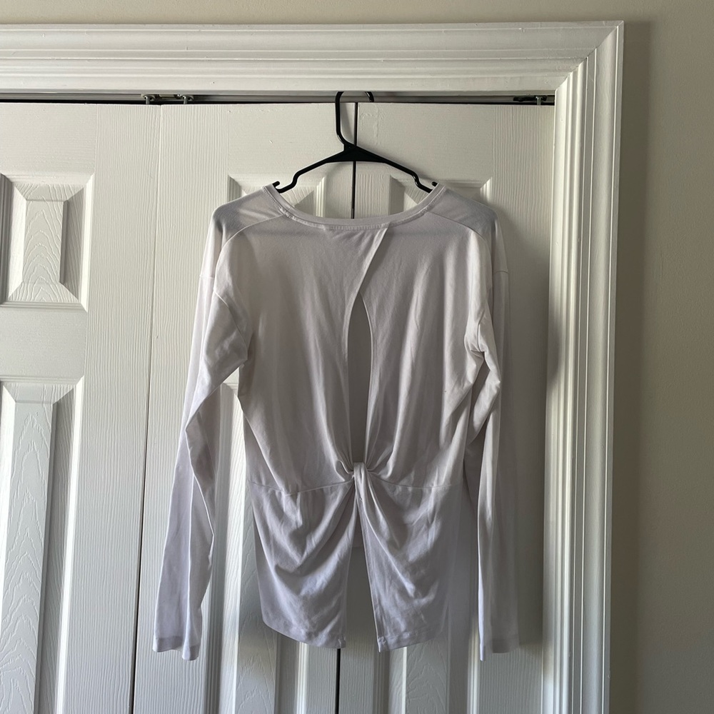Athlete essence twist long sleeve top